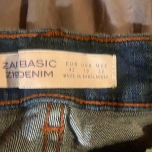 Distressed blue jeans